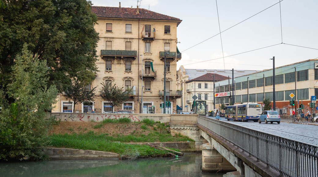 Aurora featuring a bridge and a river or creek