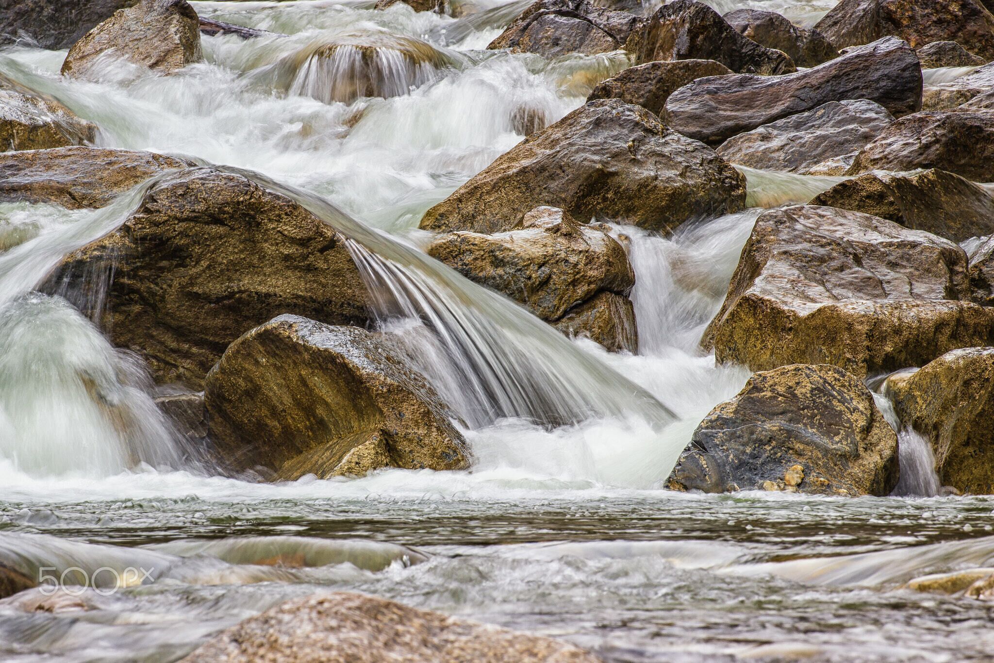 500px provided description: Die Ammer bei Saulgrub [#Winter ,#Wasser ,#Frost ,#Bach ,#Fels ,#Langzeitbelichtung ,#Steine ,#Braun ,#Kalt ,#Eisig ,#Bachlauf ,#Ammer]
