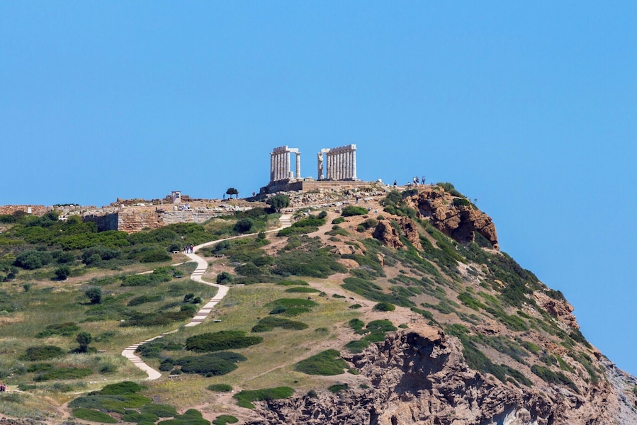 The ancient Temple of Poseidon in the distance standing guard over the vast Mediterranean Sea.
http://www.divebuddies4life.com/making-friends-with-poseidon/