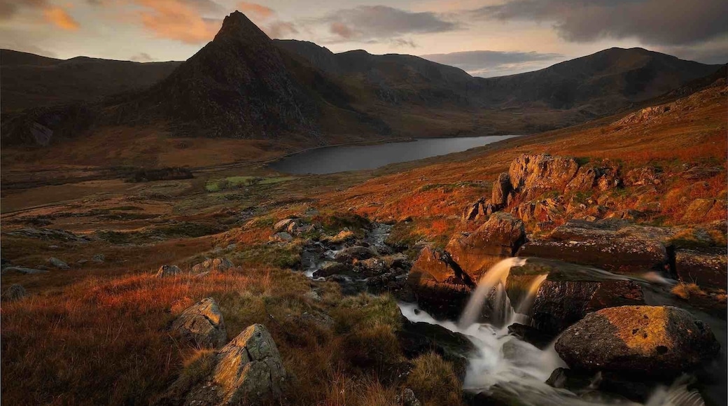 The waterfall runs down into Llyn Ogwen, with Tryfan in the. Background, taken at first light.
