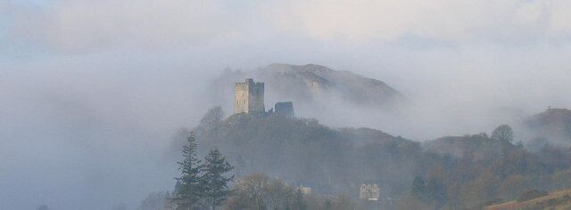 Dolwyddelan Castle in the early morning mist. Just occasionally on an early spring morning the mist will swirl around the Castle. This picture was taken from the garden of Llys y Gwynt on such a morning in February 07.