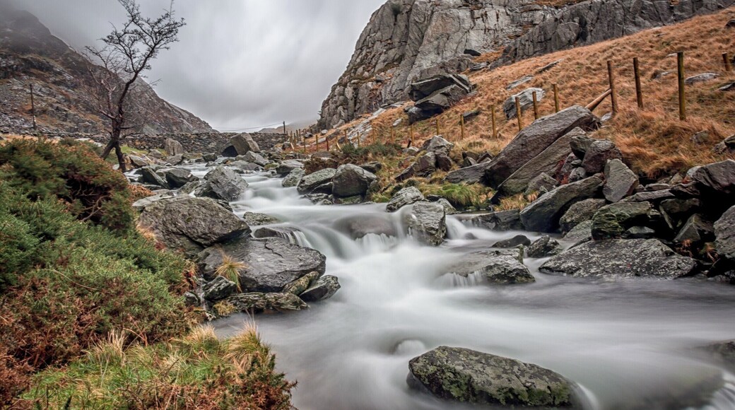 The rugged landscape of North Wales must be seen to be truly appreciated. The weather can chance rapidly and you must be prepared. This long exposure shows the icy cold mountain river flowing down the valley.