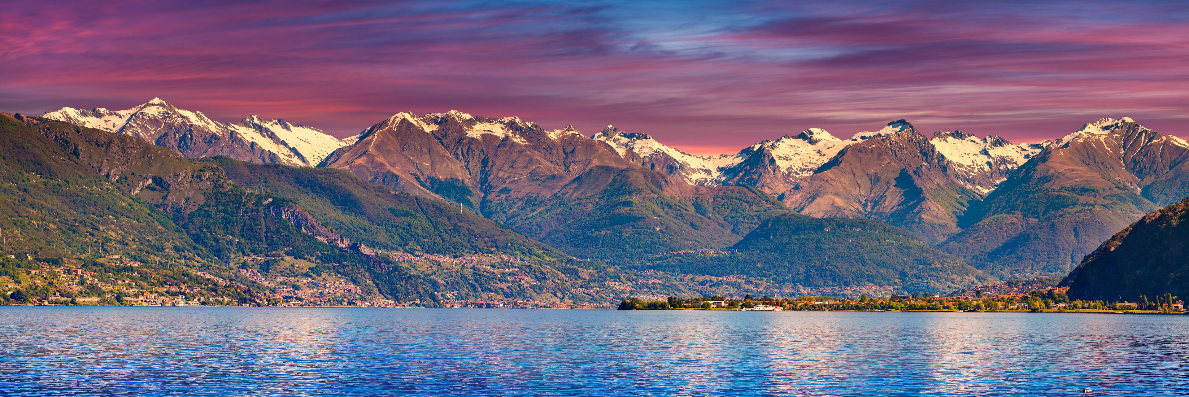 Panorama of the city Dervio at sunset