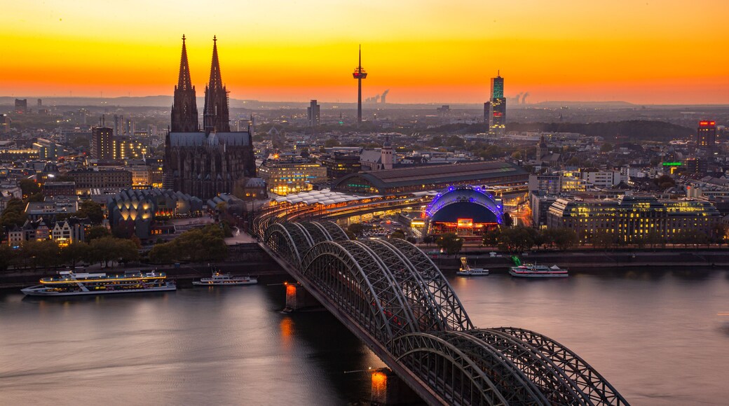 Cologne Triangle Panorama featuring a sunset, heritage architecture and landscape views