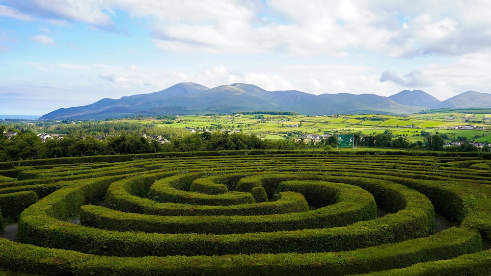 The Peace Maze in Castlewellan, Northern Ireland with The Mourne Mountains in the background