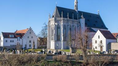 A historic church with a tall steeple and intricate architecture.