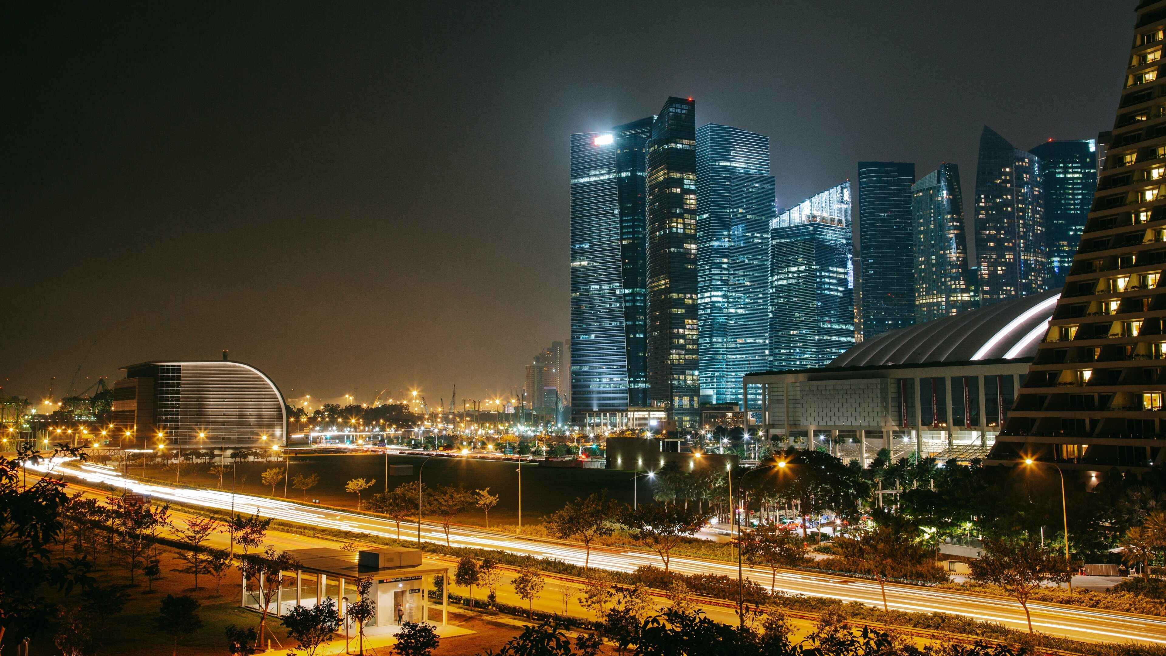 Gardens by the Bay which includes night scenes, a city and landscape views