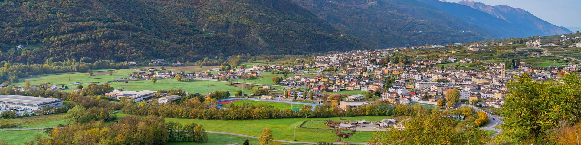 Aerial view of the valley from Chiuro, Valtellina Italy, background the Bergamasque alps and prealps