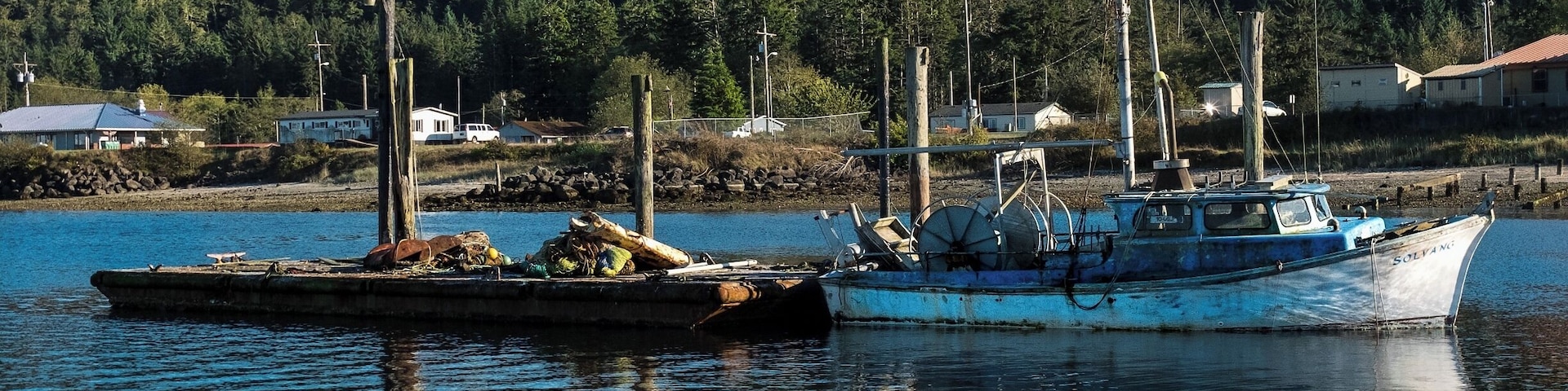 A peaceful moment on the quiet, shimmering water of Neah Bay.