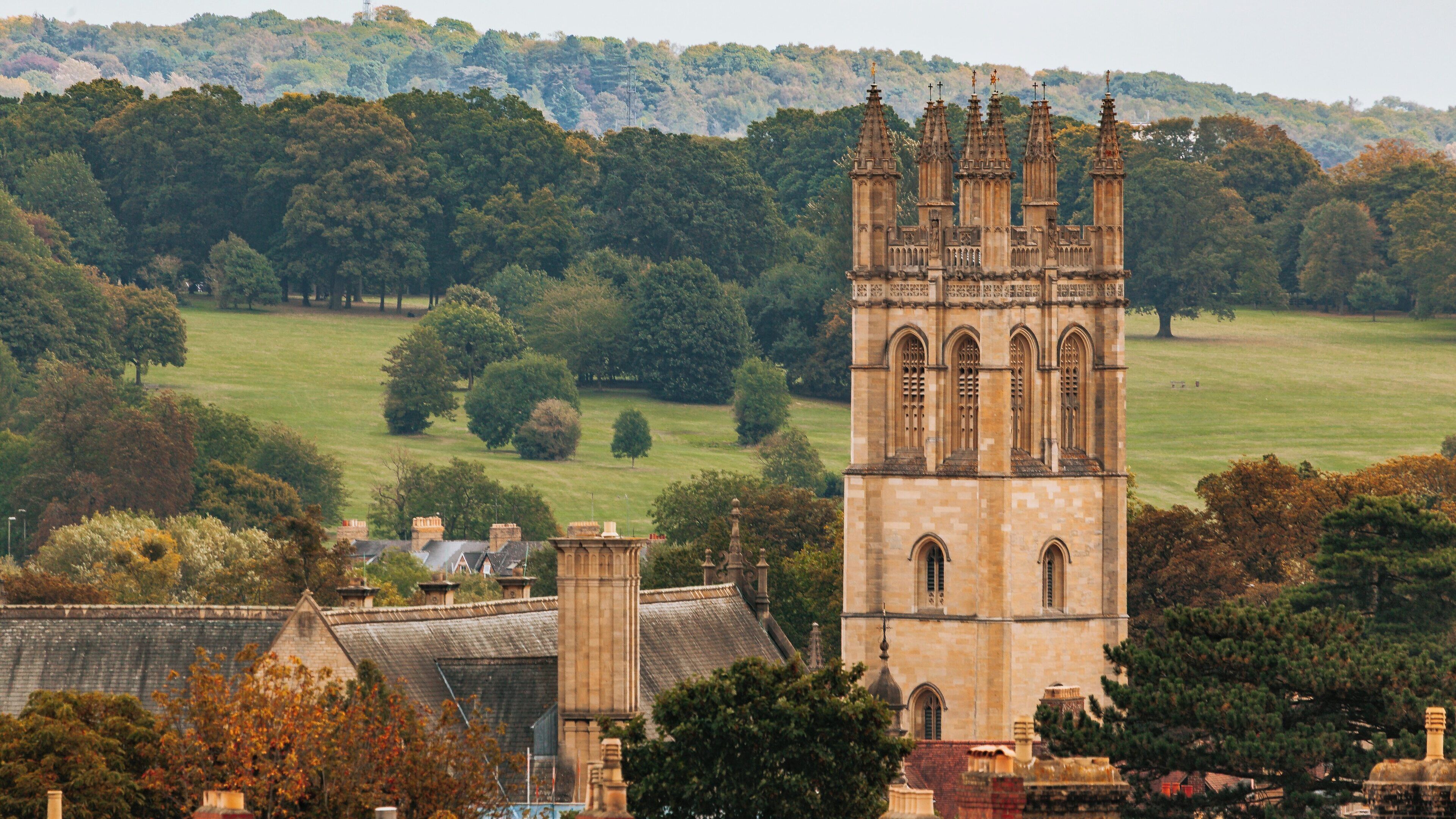 Carfax Tower stands prominently among the scenic landscape of Oxford City Centre in England, showcasing the historical architecture and natural beauty of the area