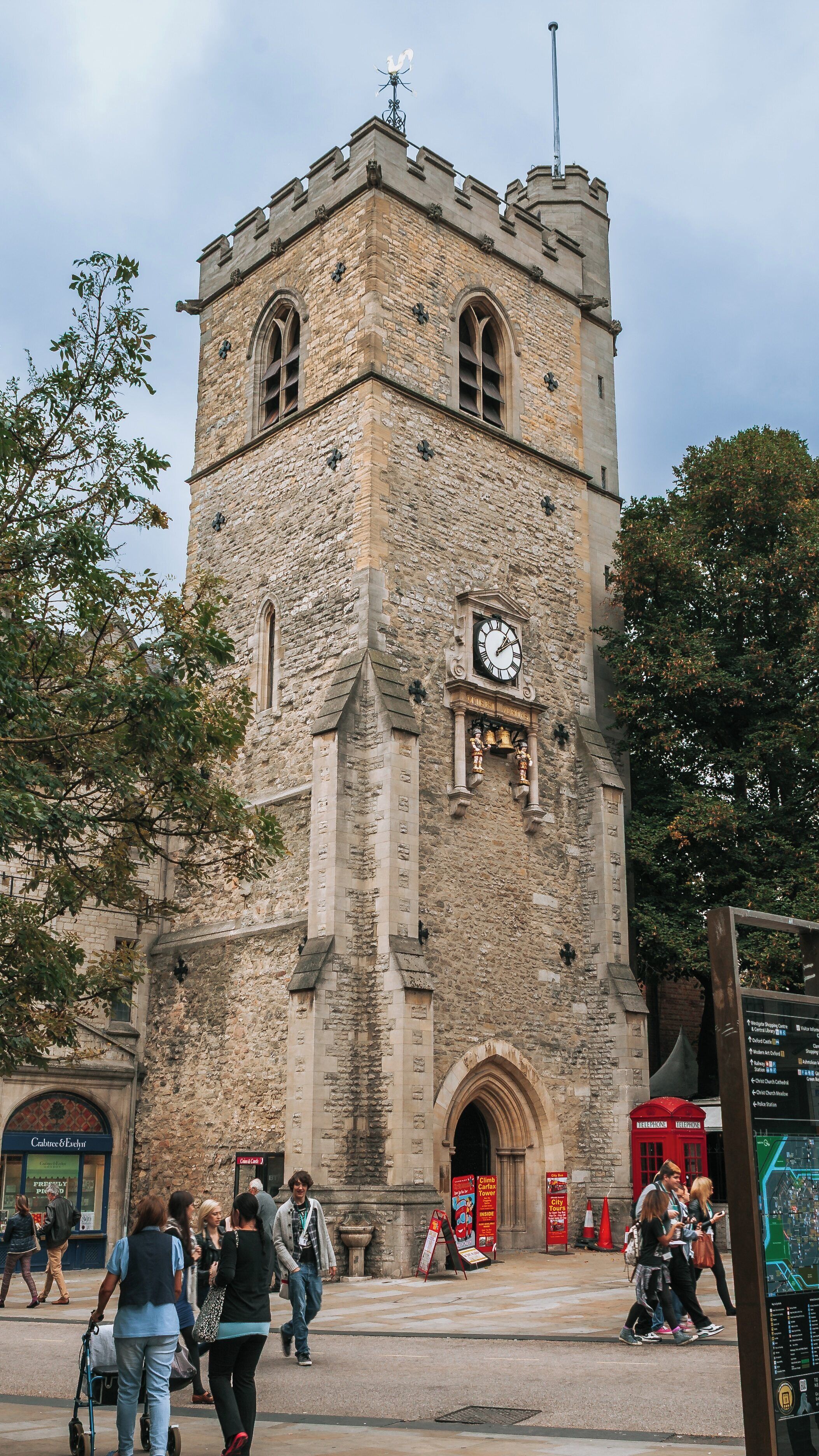 Carfax Tower stands prominently in Oxford City Centre, a historical landmark visited by many tourists and locals alike throughout the day