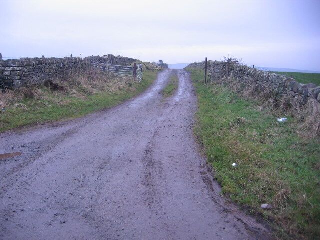 Track to Moresby Moss. Half on the left now used for farmer stores of stones muck etc.