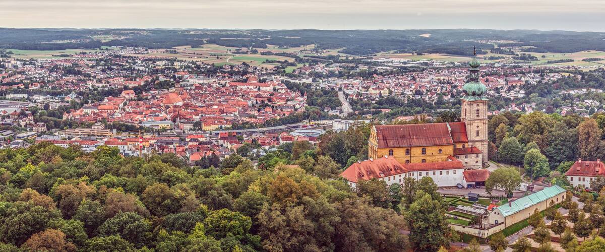 A town with a prominent church and surrounding buildings.