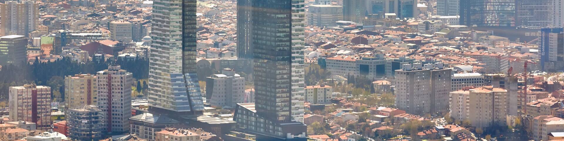 Urban landscape of European side of Istanbul and Bosphorus Strait on a horizon. Shooting through the glass.