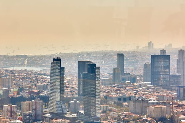 Urban landscape of European side of Istanbul and Bosphorus Strait on a horizon. Shooting through the glass.