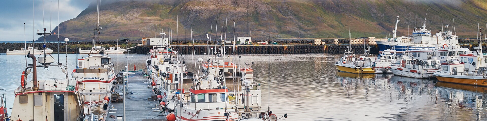 Bolungarvik, Iceland / Iceland - september 2018: Fishing boats in the harbor of Bolungarvik, Iceland.