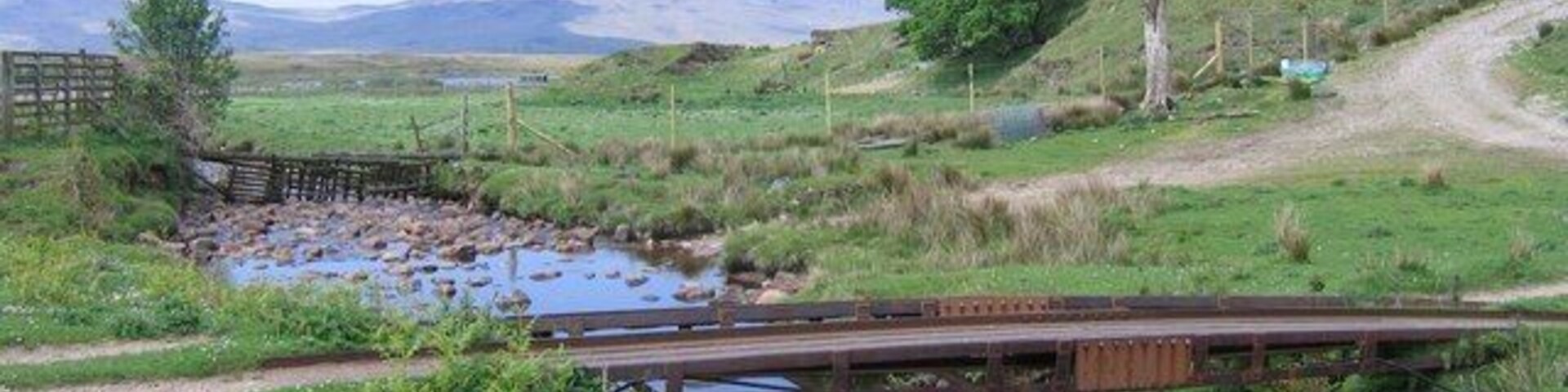 Cnocbreac The bridge at Cnocbreac with the fishing loch of Loch a' Chnuic Bhric just visible.