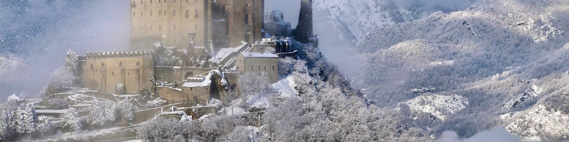 The Sacra di San Michele, sometimes known as Saint Michael's Abbey, is an architectural complex built on top of Mount Pirchiriano, situated on the south side of the Susa valley, in the Piedmont region of northern Italy. Founded between the late 10th and the early 11th century, the abbey is located along the pilgrimage route that joins Monte Sant'Angelo, in the south of Italy, to Mont Saint-Michel, in the north of France.