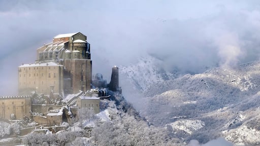 The Sacra di San Michele, sometimes known as Saint Michael's Abbey, is an architectural complex built on top of Mount Pirchiriano, situated on the south side of the Susa valley, in the Piedmont region of northern Italy. Founded between the late 10th and the early 11th century, the abbey is located along the pilgrimage route that joins Monte Sant'Angelo, in the south of Italy, to Mont Saint-Michel, in the north of France.