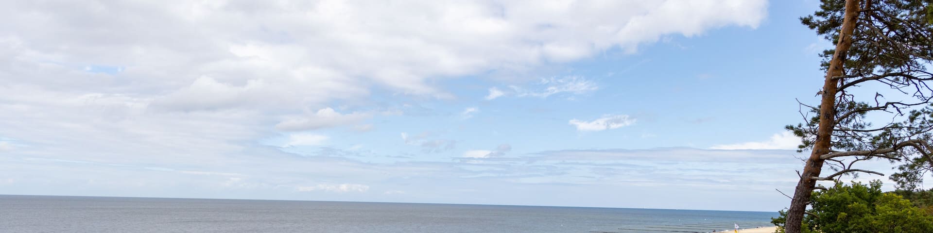 The view of the beach of Zempin on the island of Usedom with many beach chairs