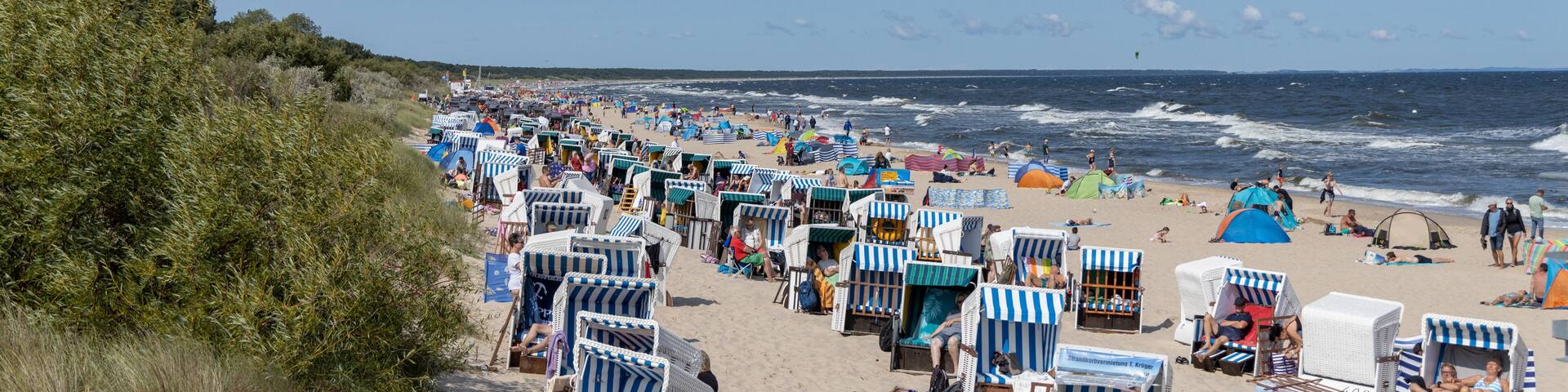 The view of the beach of Zempin on the island of Usedom with many beach chairs