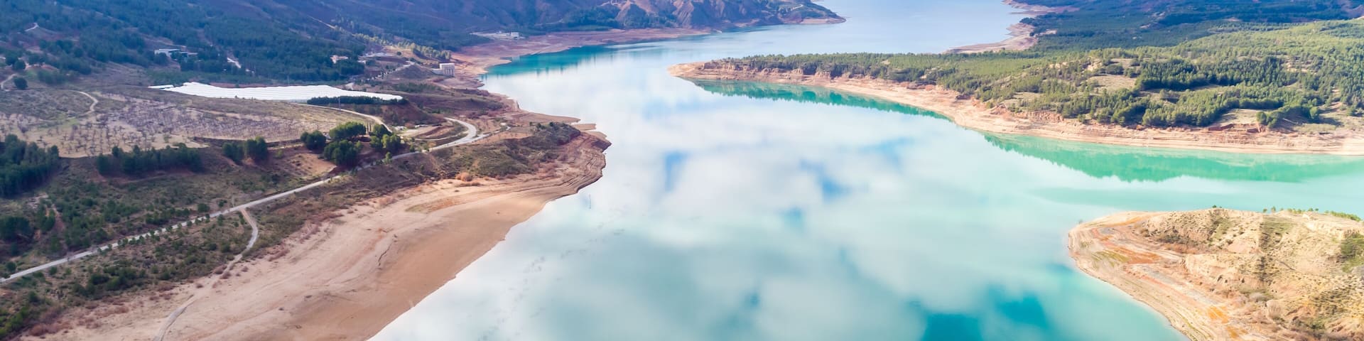 Aerial (drone) view of the "El Negratín" water reservoir, in Baza, Granada province, also known as "the interior sea". This is the third biggest water reservoir in Spain.