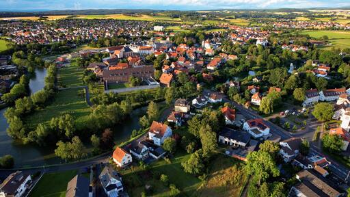 Aerial view around the old town in the city Treysa
34613 Schwalmstadt on an sunny spring day