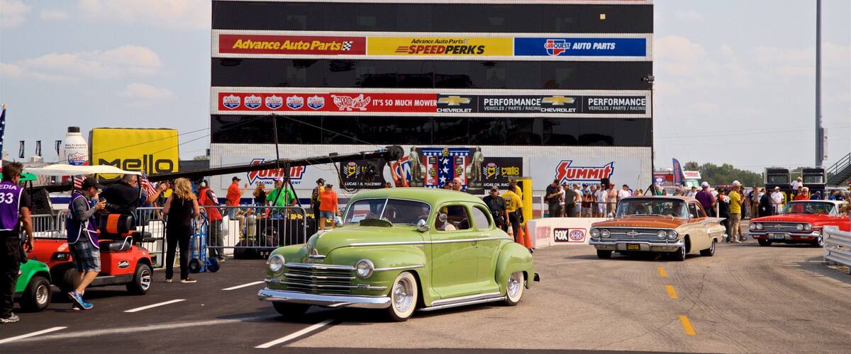 Lucas Oil Raceway as well as a small group of people