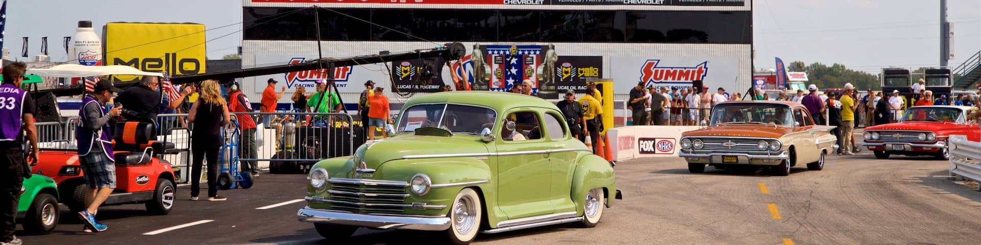 Lucas Oil Raceway as well as a small group of people