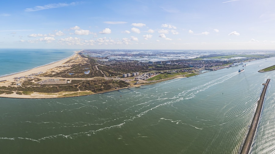 aerial panorama view of the landscape around the Maasvlakte a massive man-made extension of Europoort port and industrial facility within Port of Rotterdam in the Netherlands. High quality photo