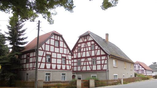 Half-timbered houses near the church in Rudelswalde (Crimmitschau, Zwickau district, Saxony)