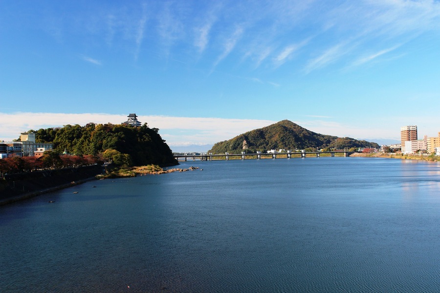 Inuyama Castle and Mount Igi seen from Inuyama Bridge of Kiso River
