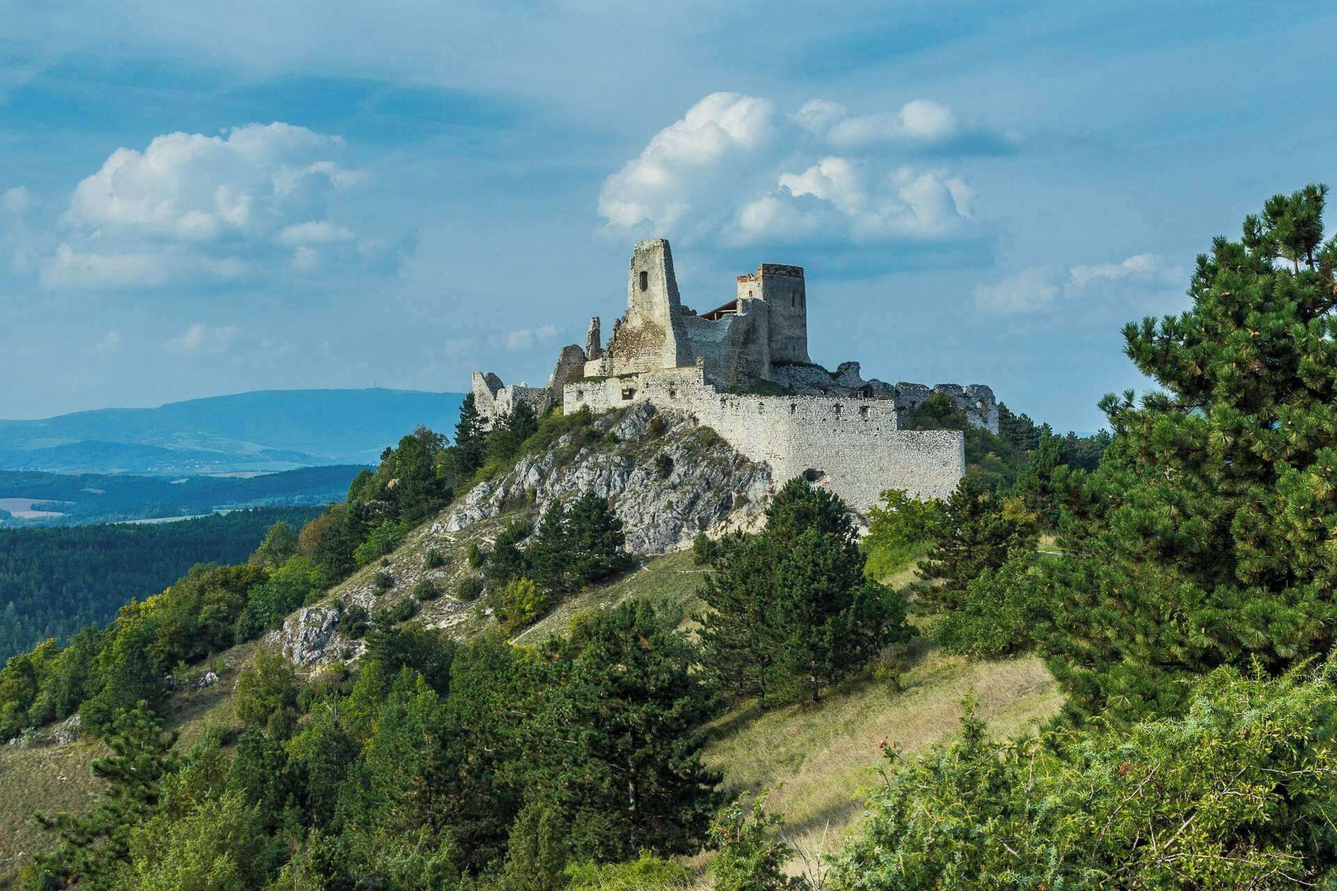 Castle ruin from mid-13th century on the top hill close the village Višnové.  The castle was a residence and later the prison of the Countess Elizabeth Báthory, who is alleged to have been the world's most prolific female serial killer.
 