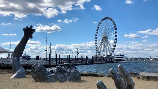 Interesting sculpture with the Capital Wheel in the background.