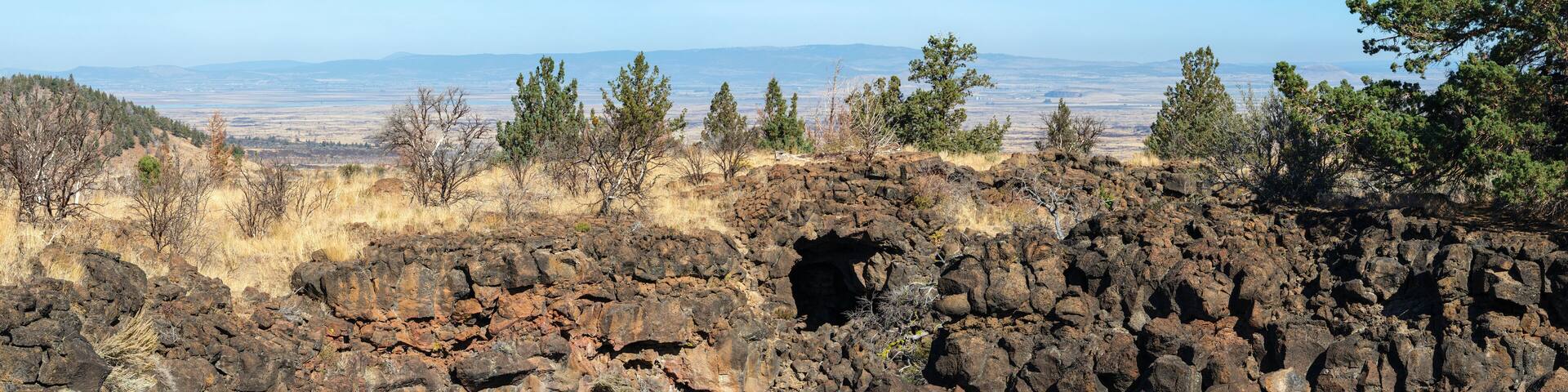 Panorama of a cross section of the lava flows near Sunshine Cave at the Lava Beds National Monument in California, USA