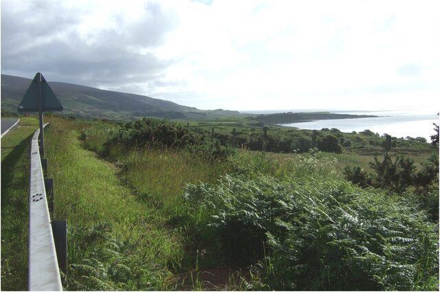View across Sput Dubh to the coast From the A9 near Allt Choll; towards a substantial (but unnamed) spit of land stretching out to sea north of Kintradwell Links.