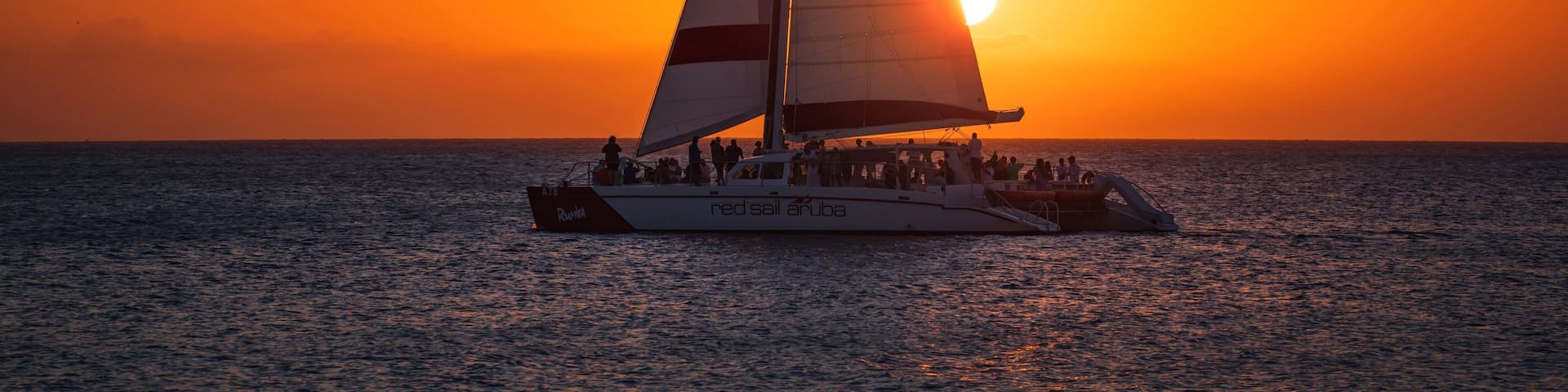 Watching the sailing boats glide across the water backlit by the setting sun at this rather low-key place on Aruba is an awesome way to end the day.