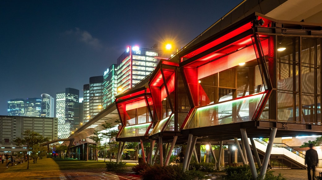 Kwun Tong showing night scenes and a city