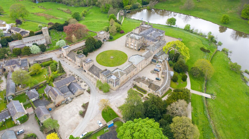 Aerial photo of the small village of Ripley in Harrogate in North Yorkshire in the UK showing the historical Ripley Castle