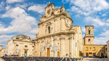View at the Cathedral of Holy Rosary in the streets of Francavilla Fontana - Italy