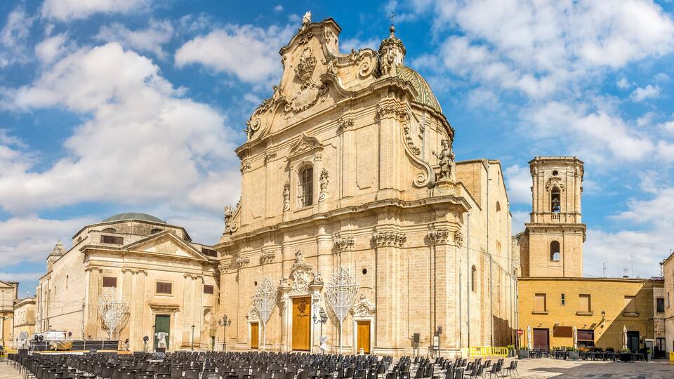 A historic church with ornate architecture and a bell tower.