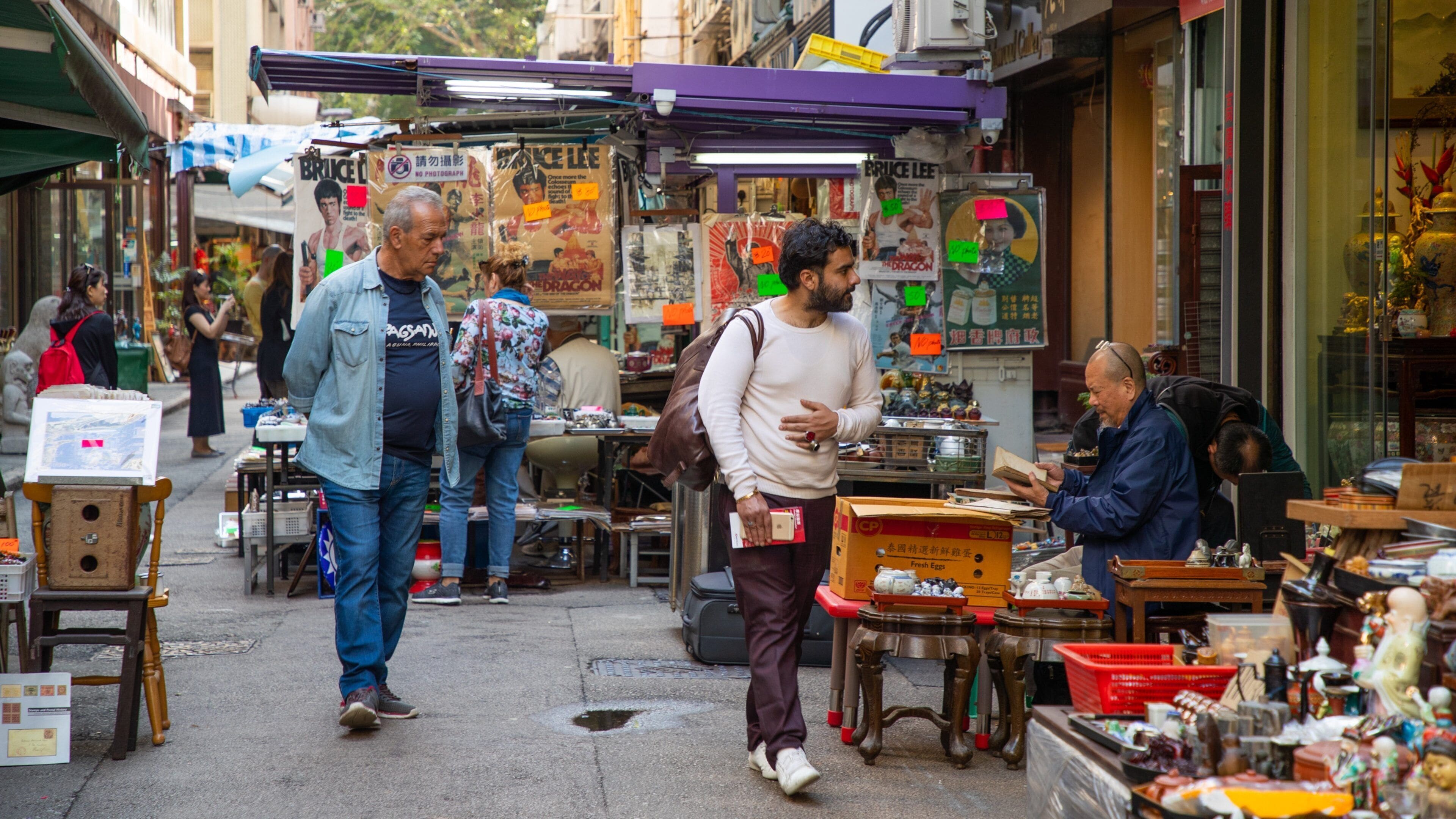 Cat Street showing street scenes and markets as well as an individual male