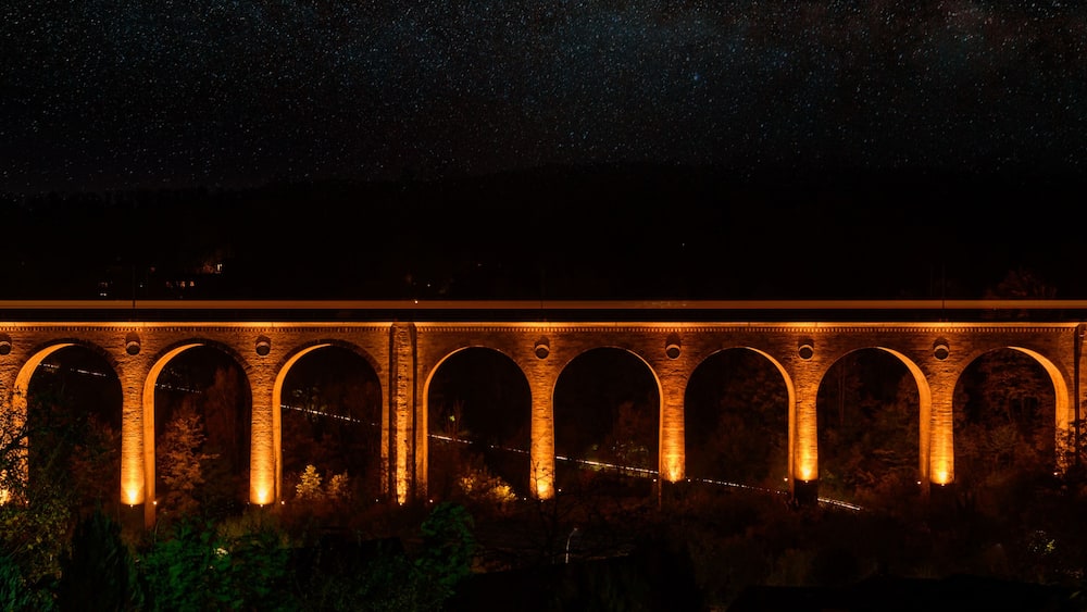 Panorama view of “Bekeviadukt“ bridge in Altenbeken Germany from 1853. Double track bent limestone railway viaduct on the main line Paderborn Warburg.