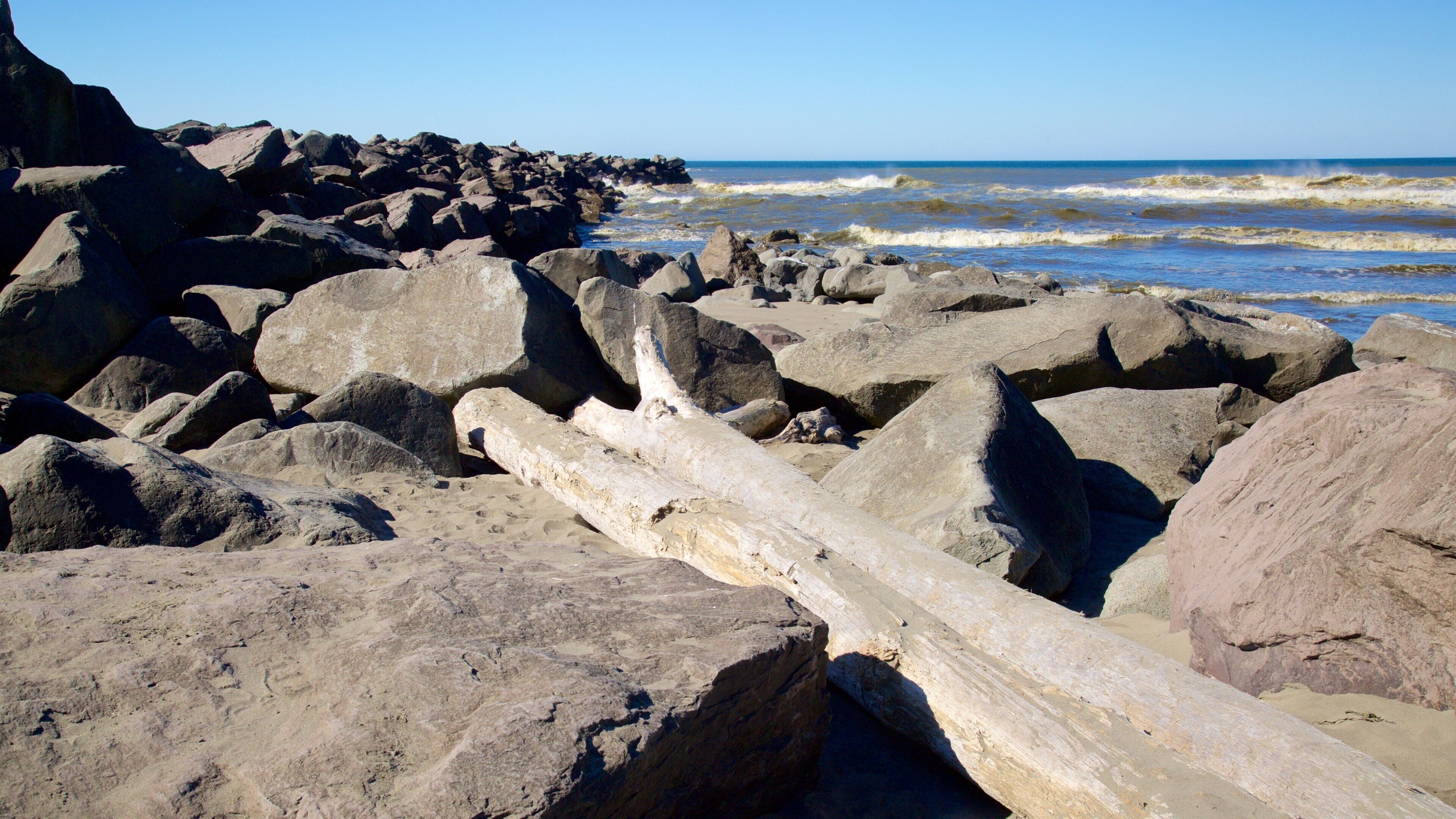 North Jetty which includes rugged coastline and general coastal views