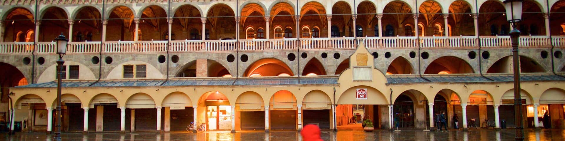 Piazza delle Erbe which includes heritage elements and road cycling