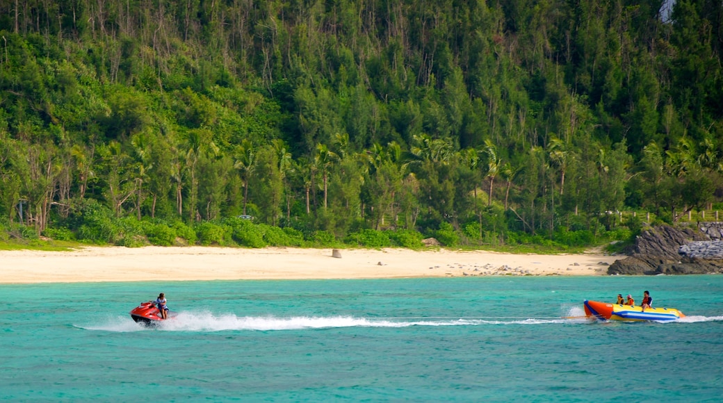 Busena Marine Park showing a beach, jet skiing and tropical scenes