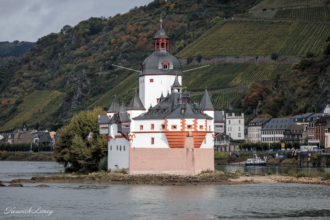 Pfalzgrafenstein Castle (Burg Pfalzgrafenstein) seen as we cruise down the River Rhine.

Seems a little bit of a strange place to build such a building.  However, it gave control of the river and the ability to charge boats to pass.