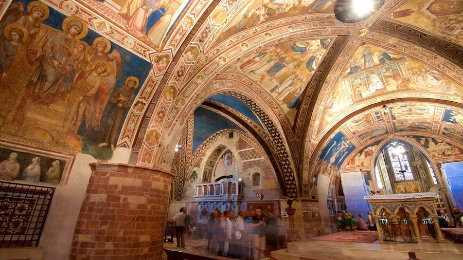 Papal Basilica of St. Francis of Assisi featuring interior views, religious elements and a church or cathedral