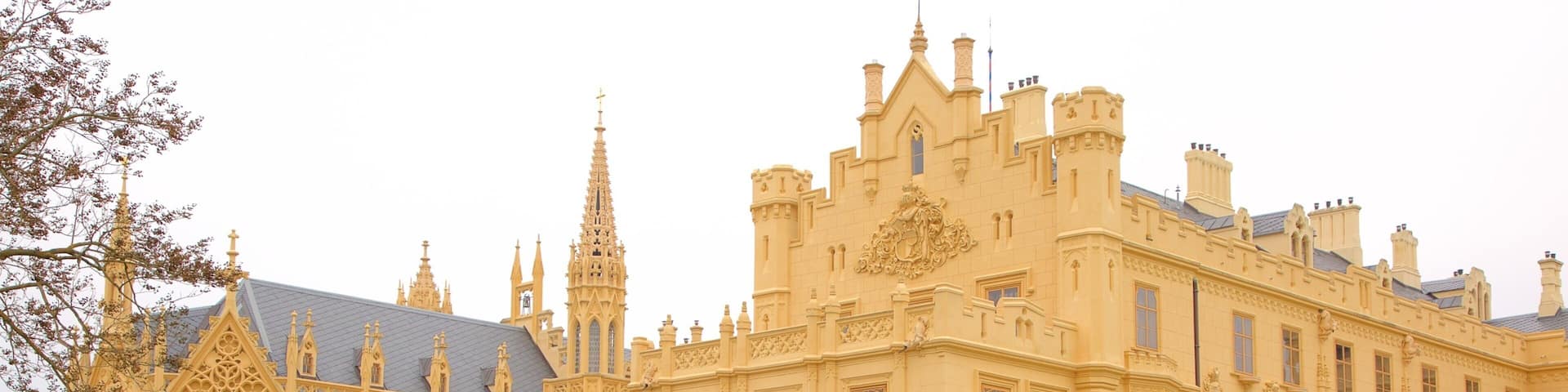 Lednice Liechtenstein Castle showing heritage architecture, a garden and heritage elements
