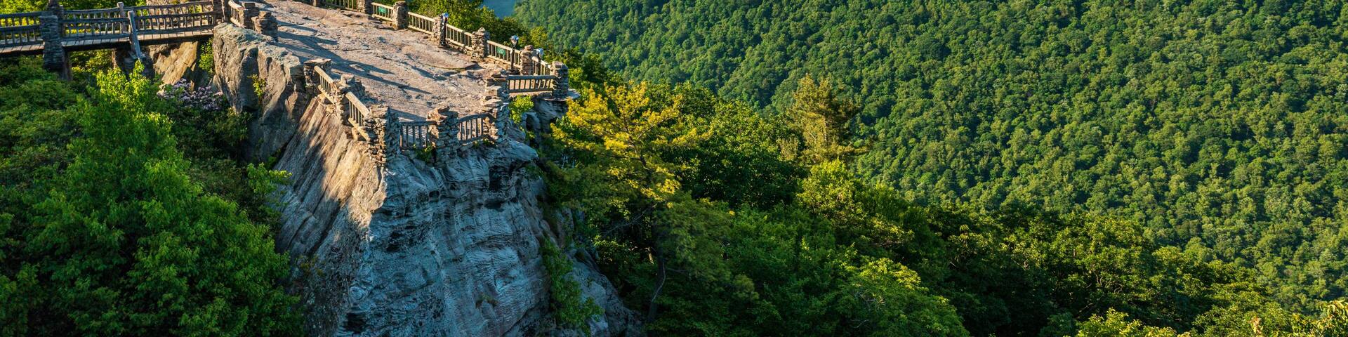 Aerial panoramic image of the Cheat River gorge and the Coopers Rock overlook and viewing platform in summer